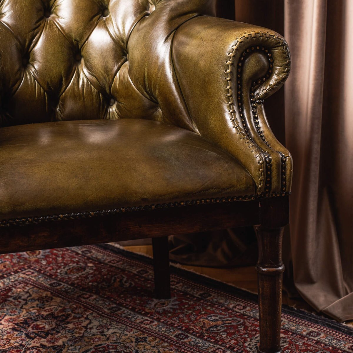 Upholstered leather armchair